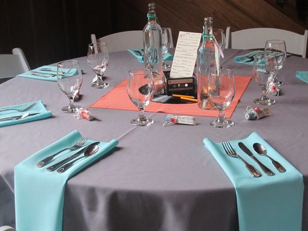 coral teal grey wedding table setting