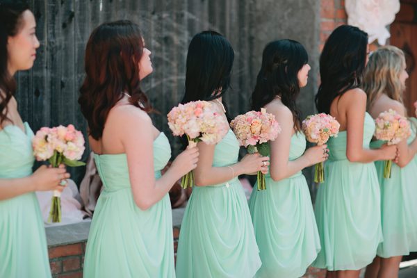 mint bridesmaid dresses peach bouquet