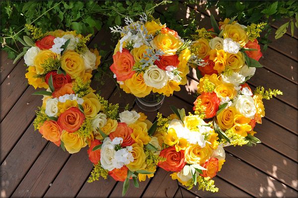 orange goldenrod roses wedding bouquet