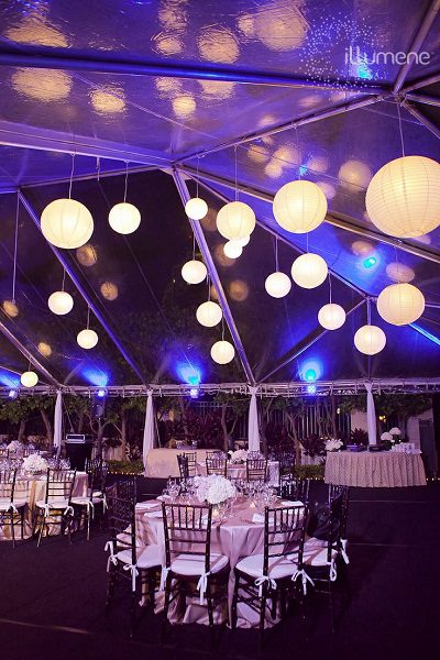 paper lanterns blue uplighting wedding decor
