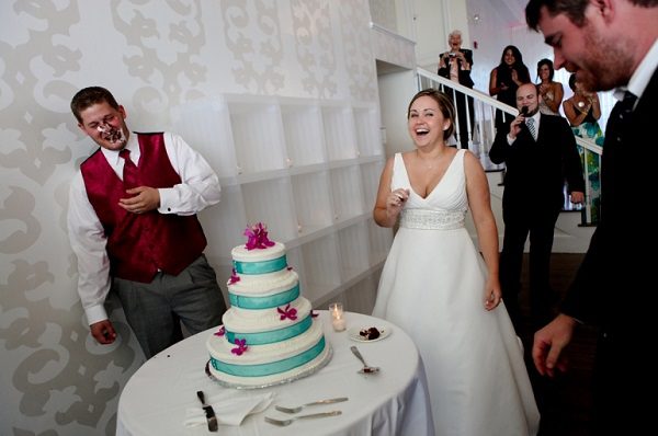fun wedding tradition cake smash