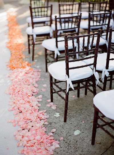 multi colored rose petals wedding aisle